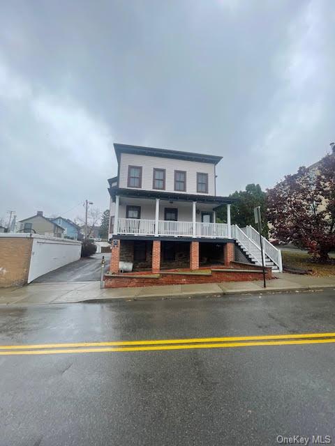 View of front of home, which faces out to East Main Street & is directly opposite from Coopers