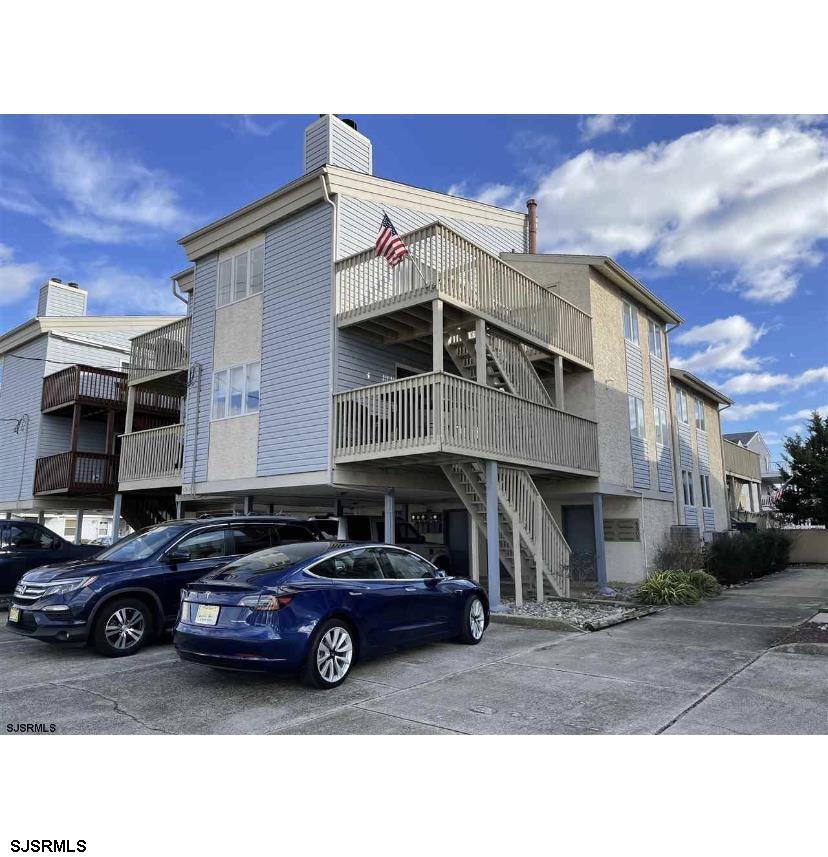 a car parked in front of a house