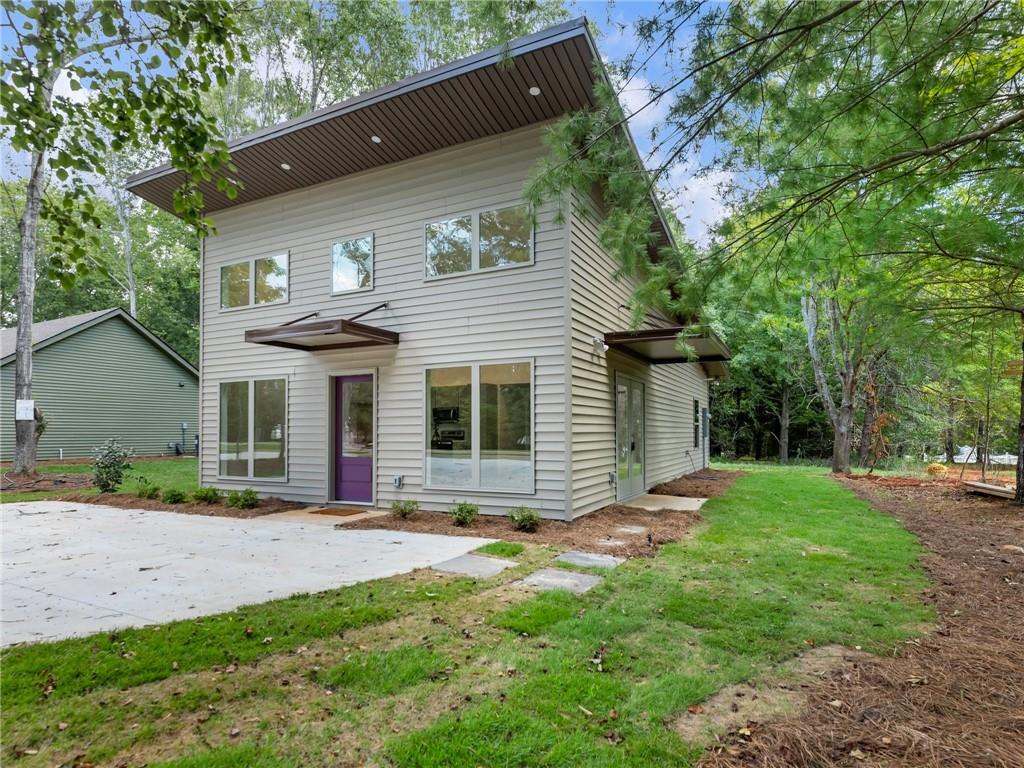 front view of a house with a yard