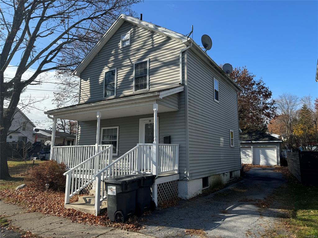 a front view of a house with balcony