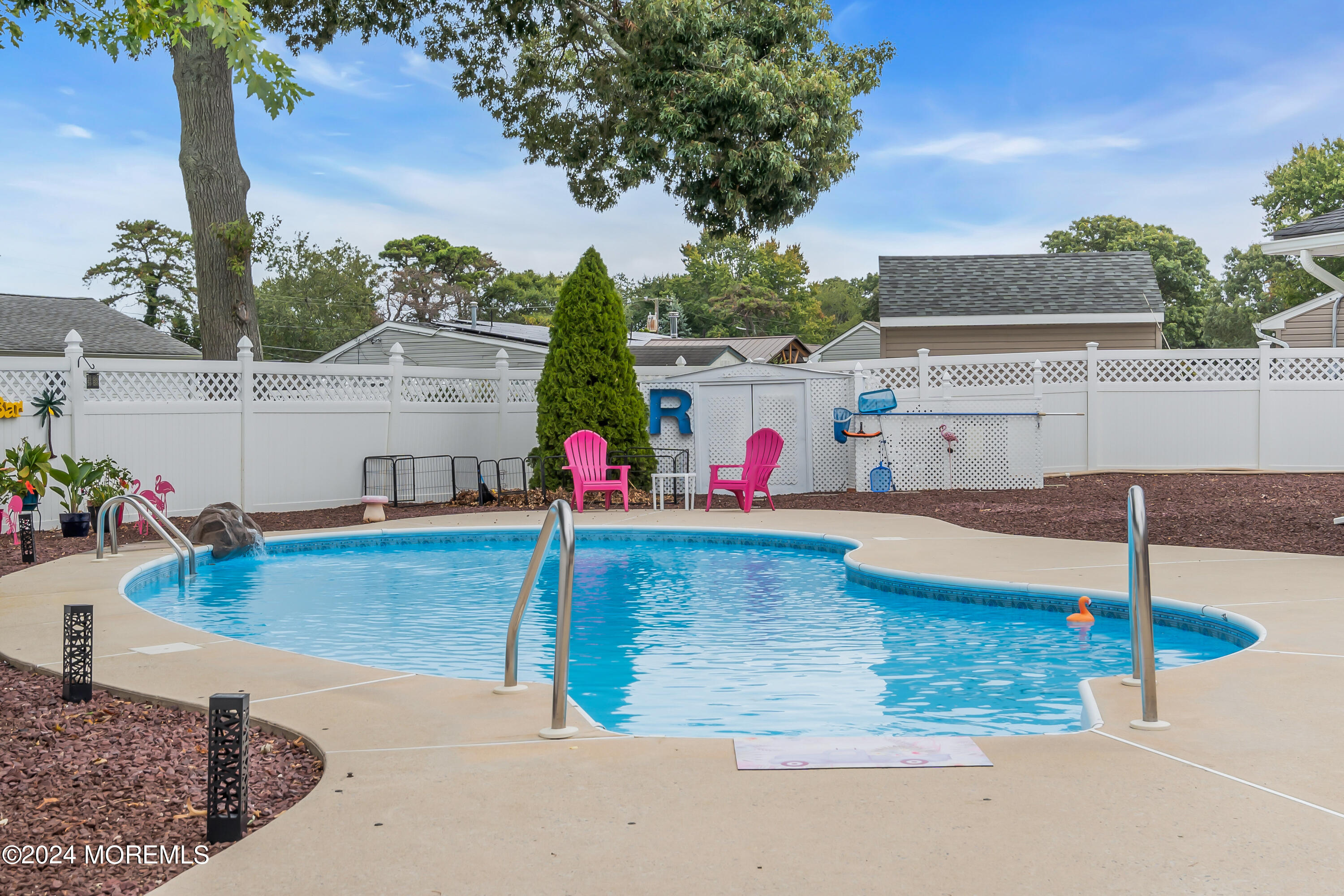 swimming pool view with a outdoor space