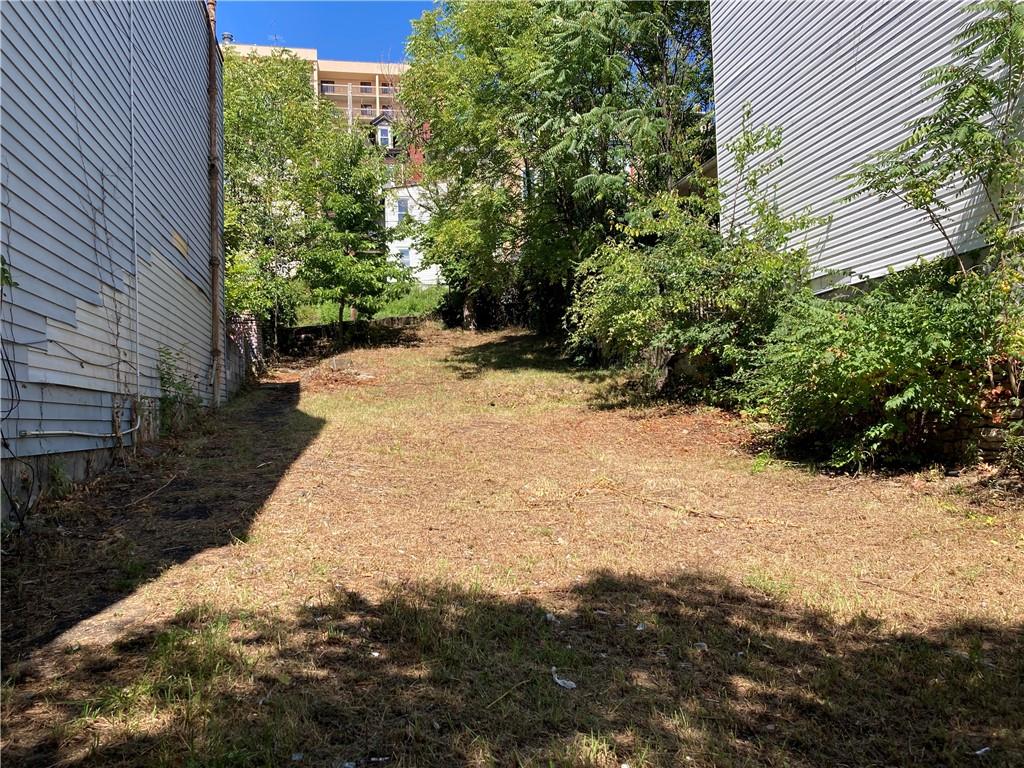 a view of a backyard of a house