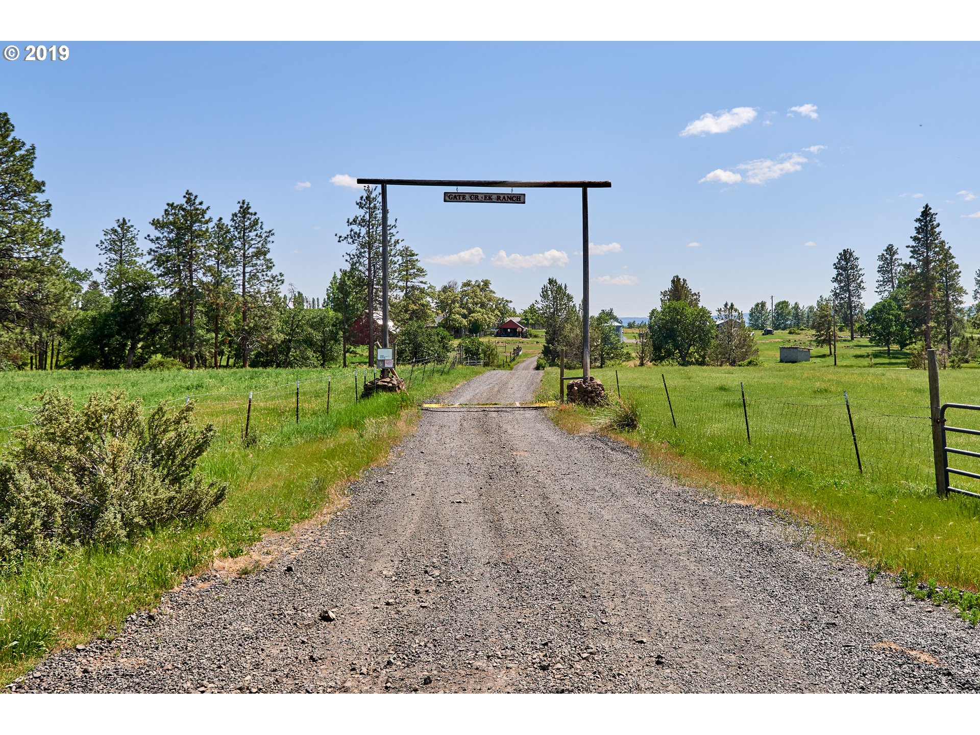 a view of a park with welcome board