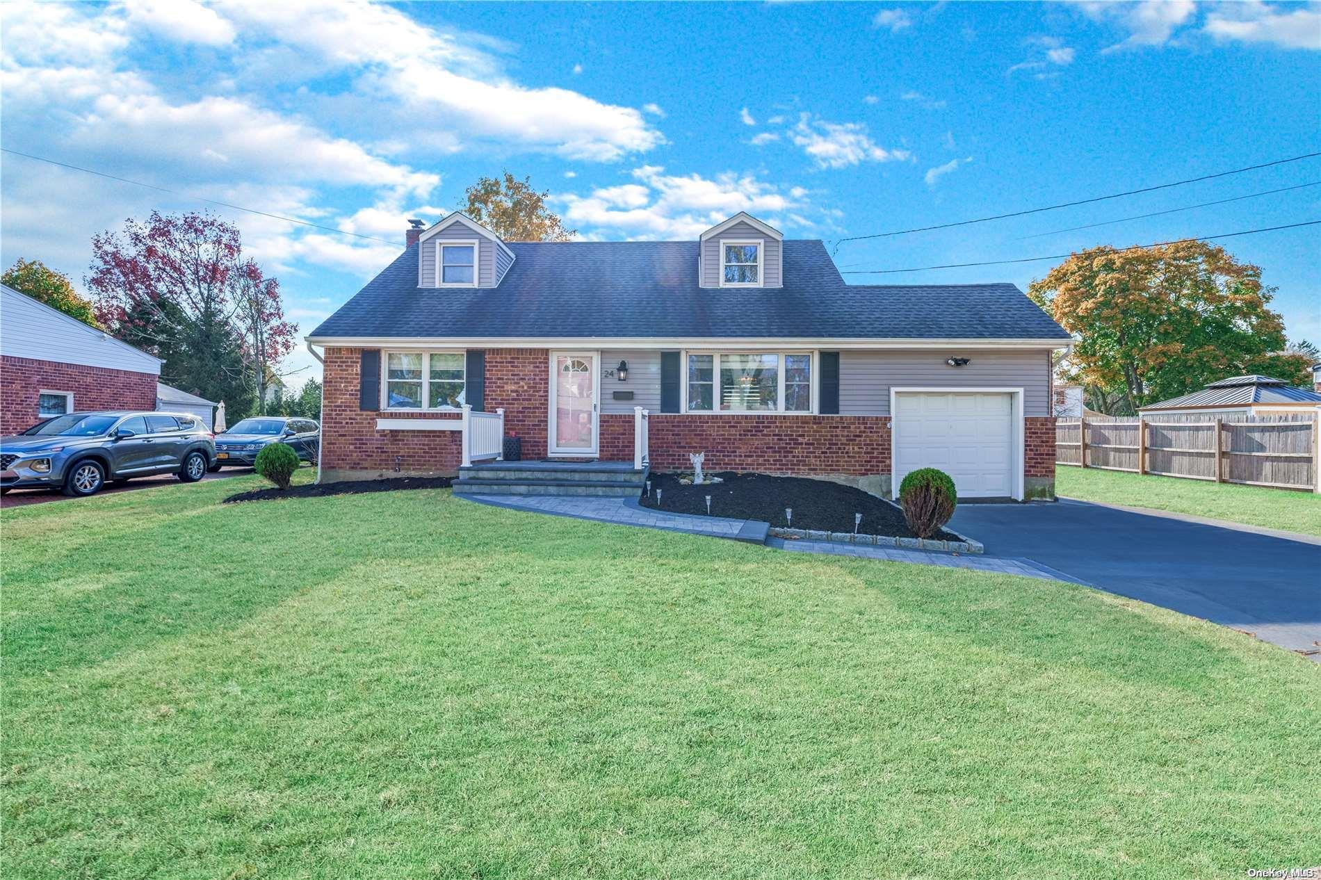 a view of a house with a back yard