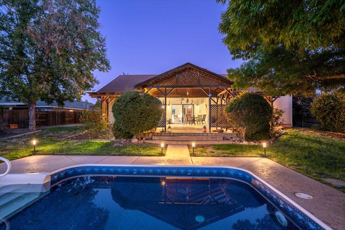 a view of swimming pool with garden