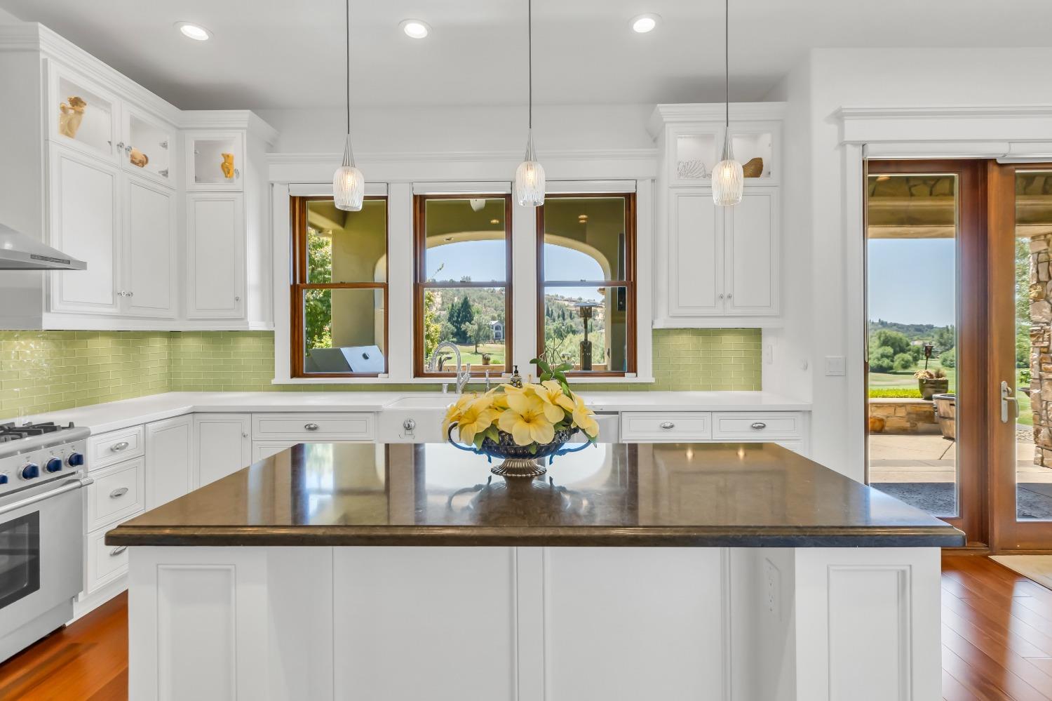 a kitchen with a sink and a window