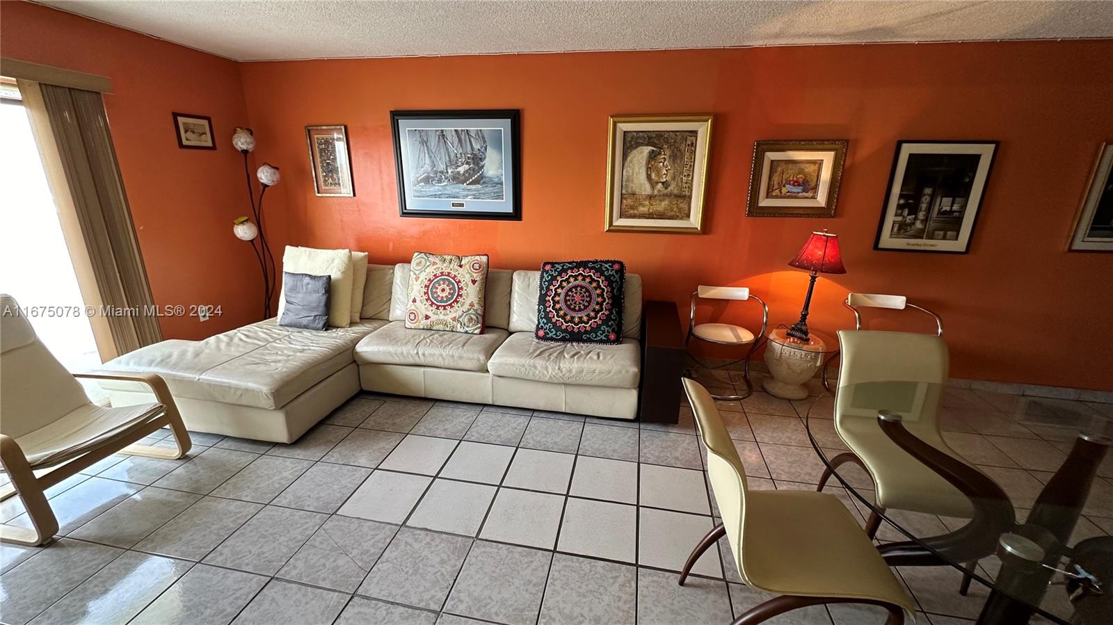 a living room with furniture and a couch