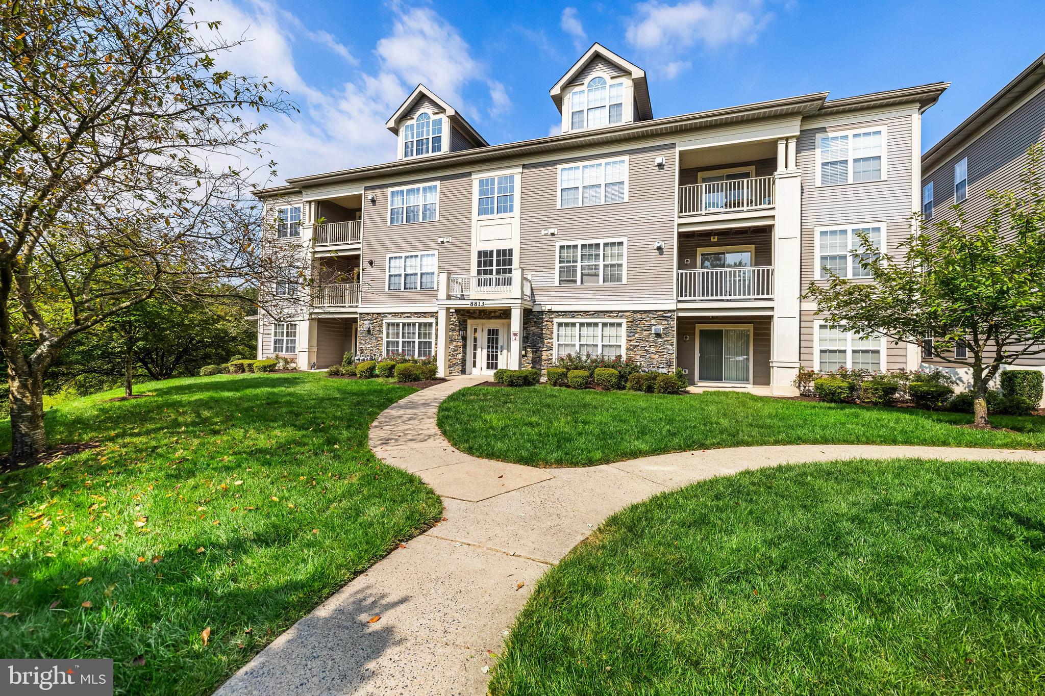 Welcome Home to 8813 Stone Ridge Cir #101, 21208!