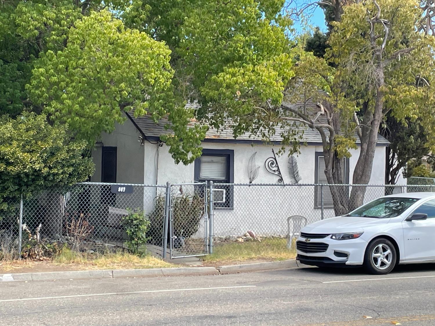 a car parked in front of a house