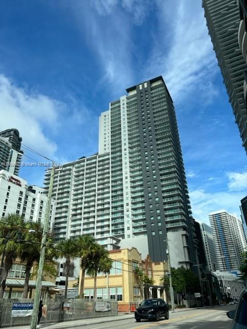 a front view of a building with street view