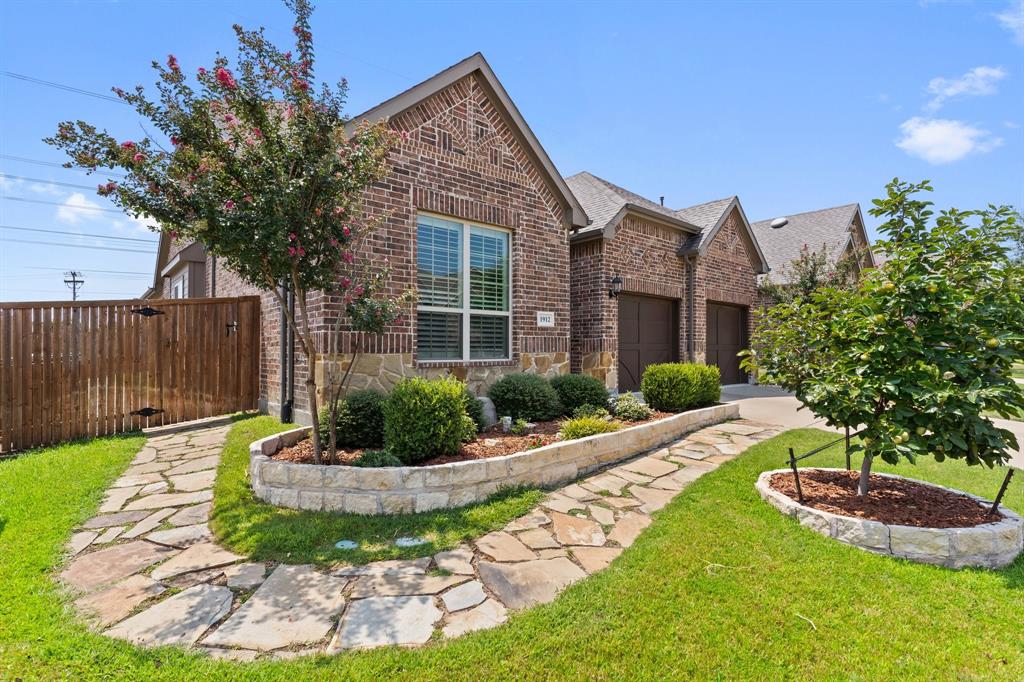 View of front of house with a front yard