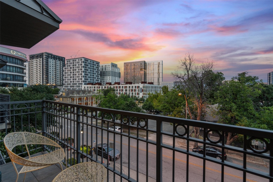 Situated in the beautiful Judges Hill neighborhood, this third-floor corner end unit offers a unique blend of modern luxury and serene living