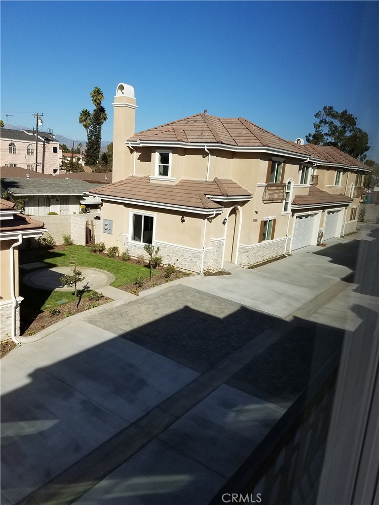 a view of a house with a swimming pool