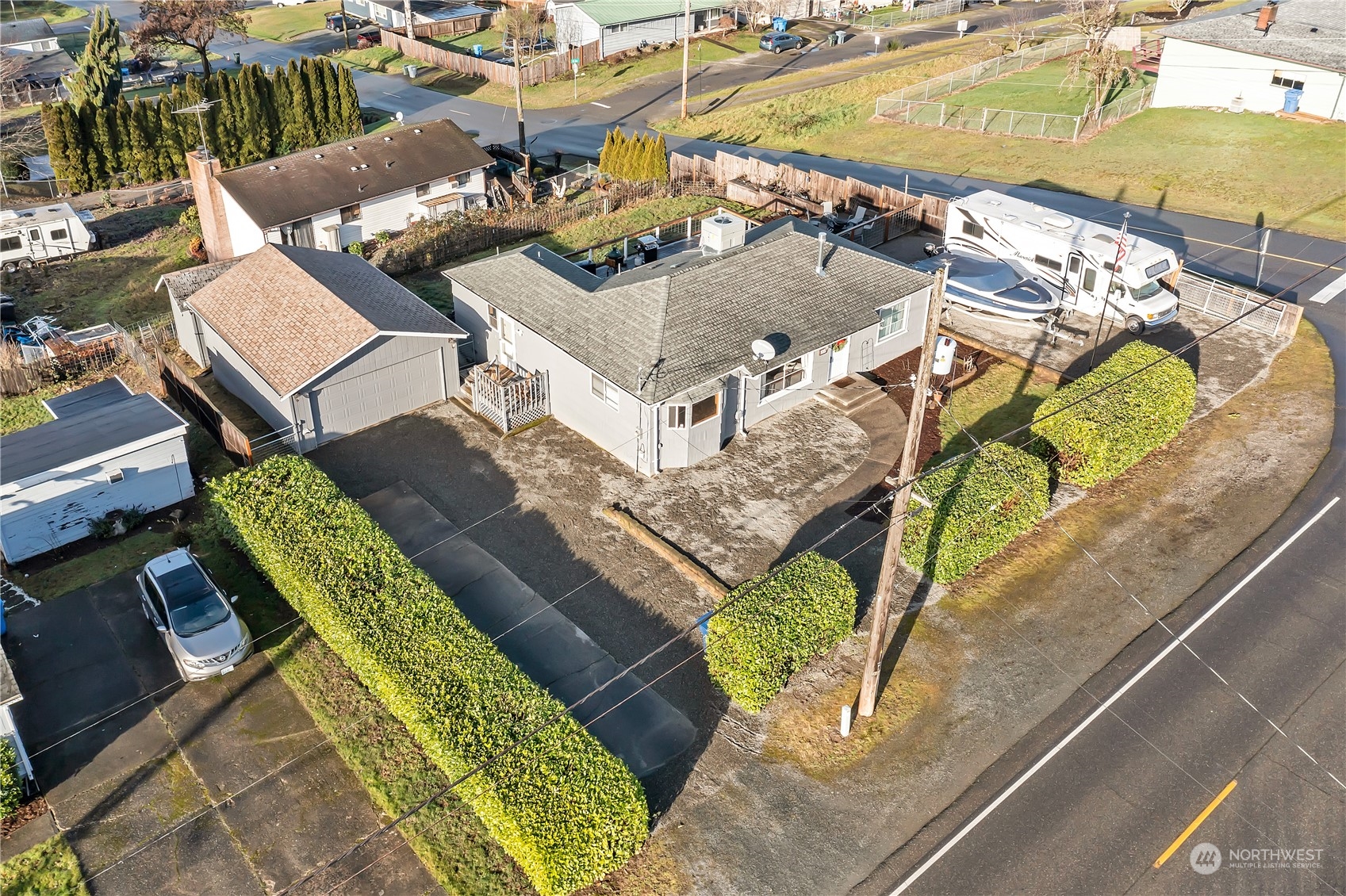 an aerial view of a house with outdoor space