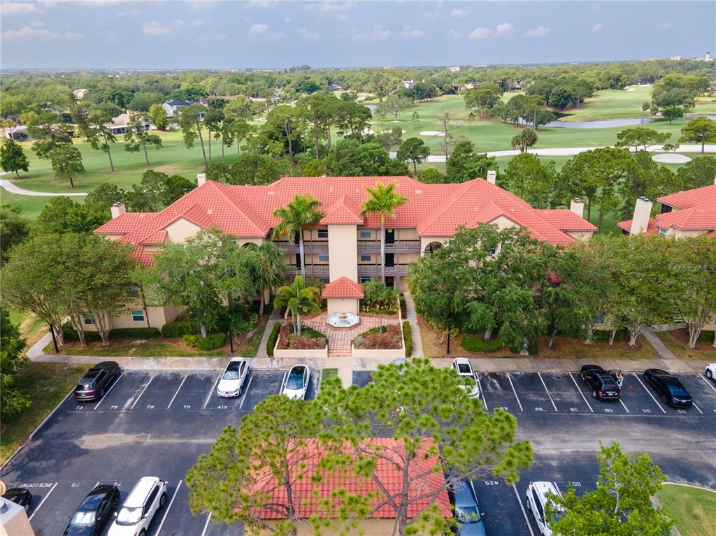 an aerial view of a houses with outdoor space and street view