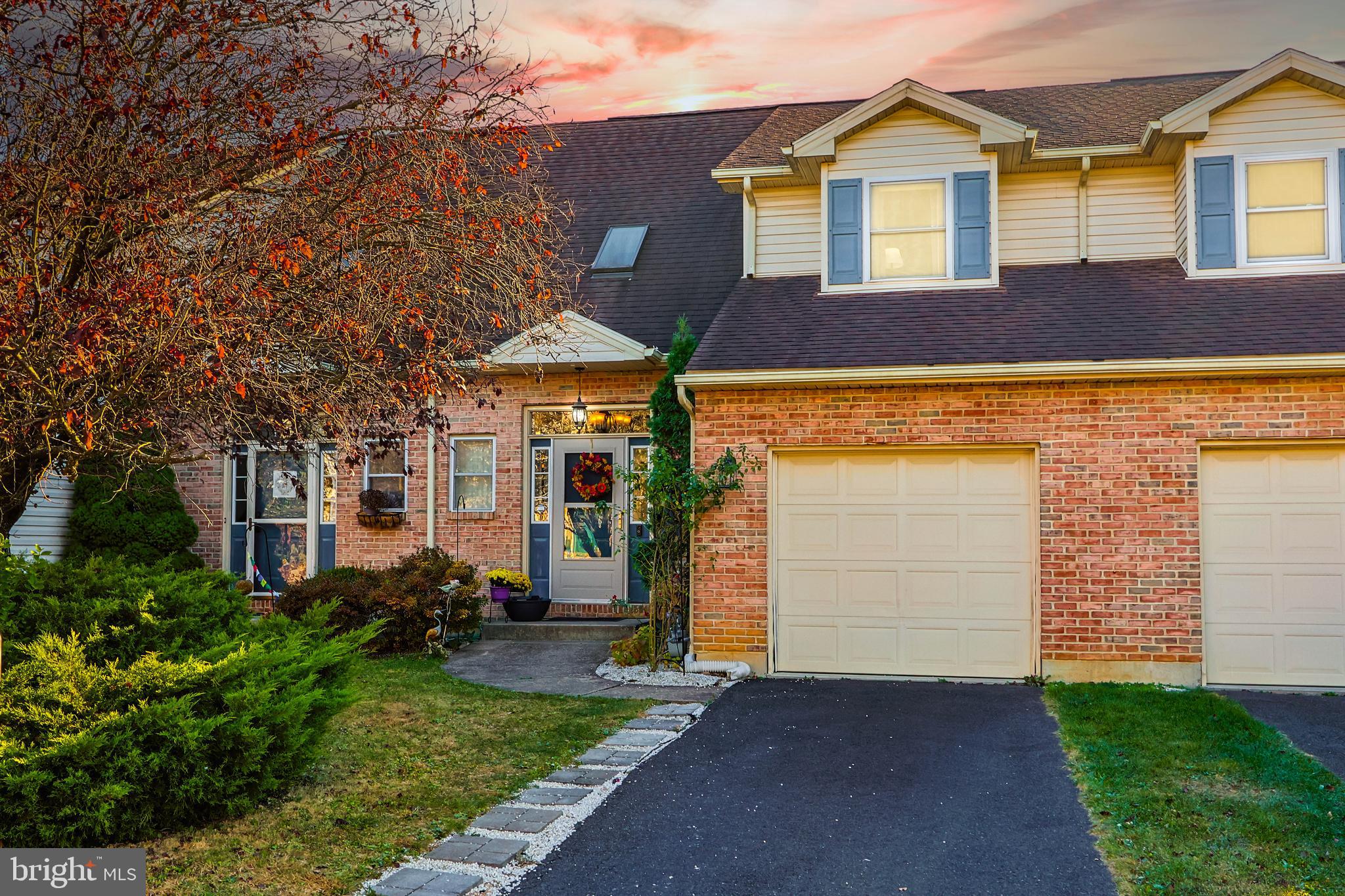 a view of house with yard