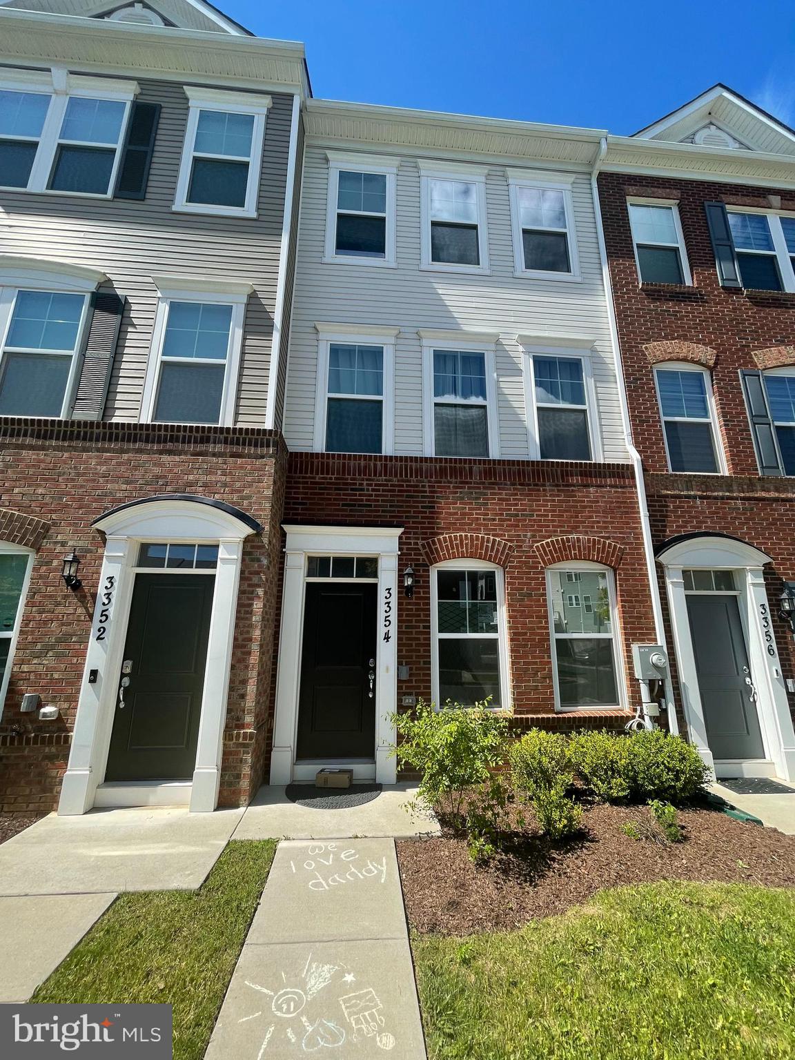 a front view of a multi story residential apartment building