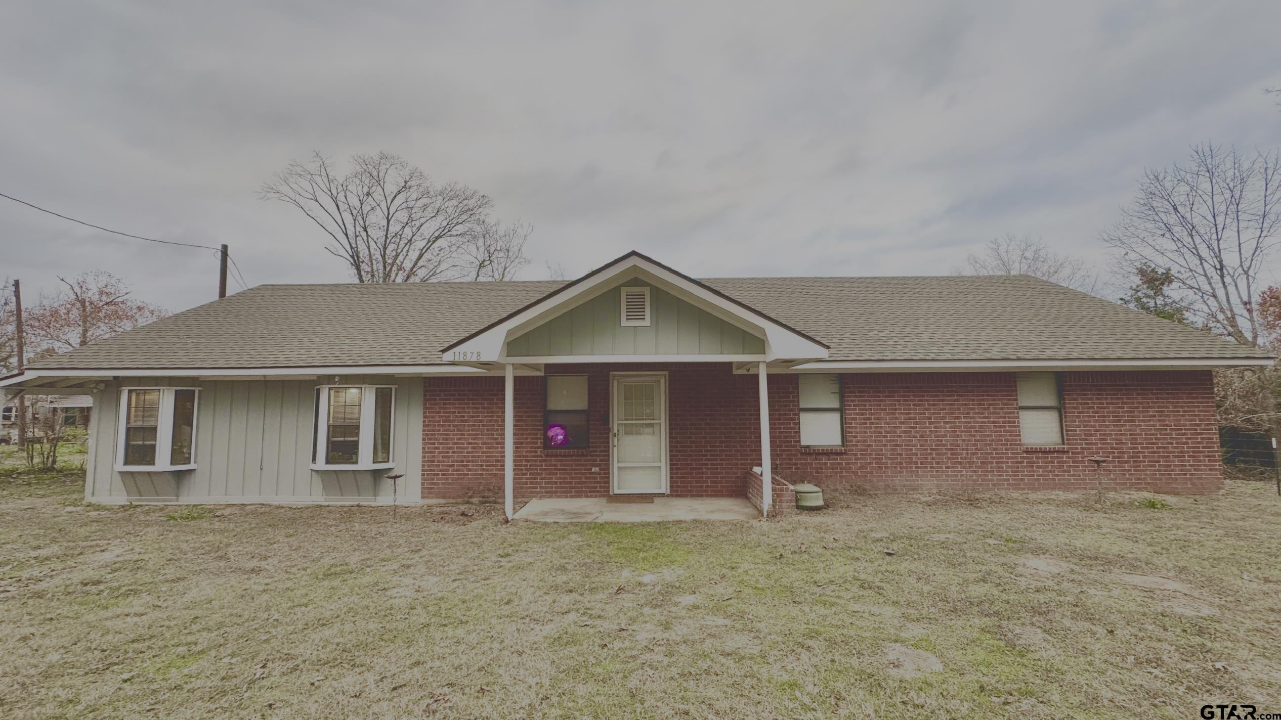 a front view of house with yard