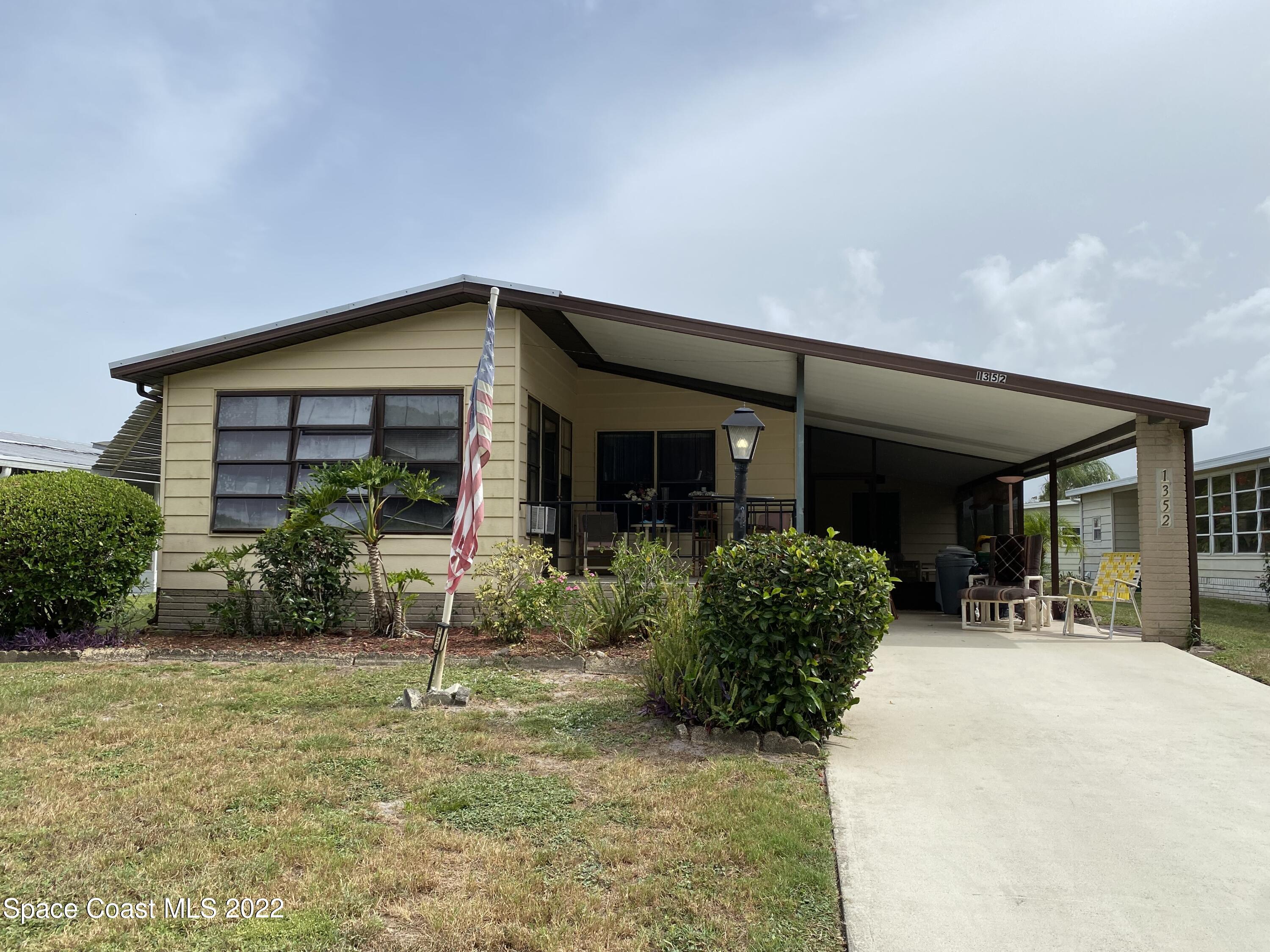 a view of a house with patio