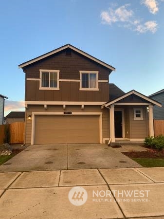 a front view of a house with yard