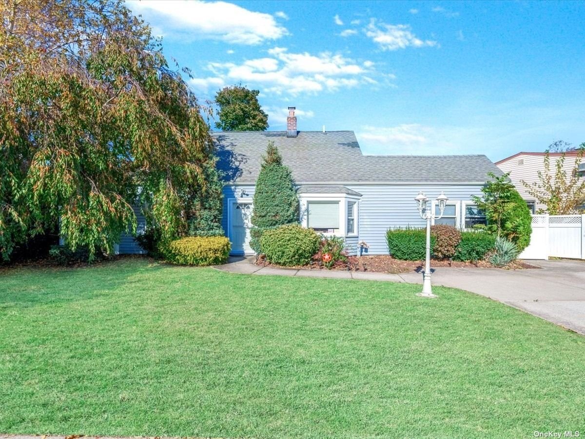 a house view with a garden space