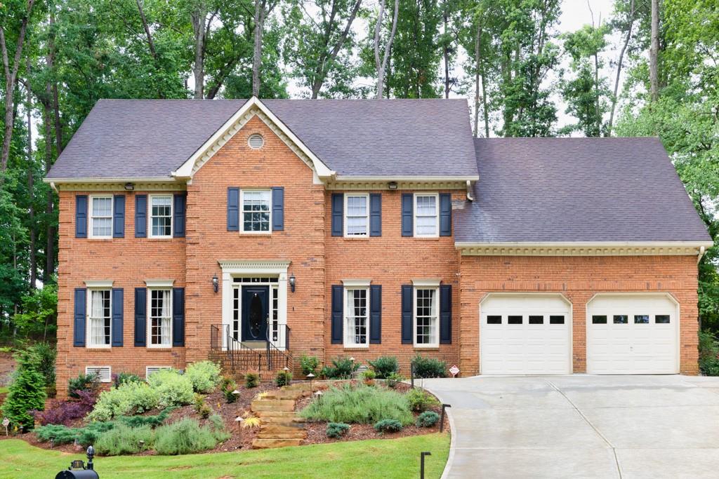 front view of house with a yard