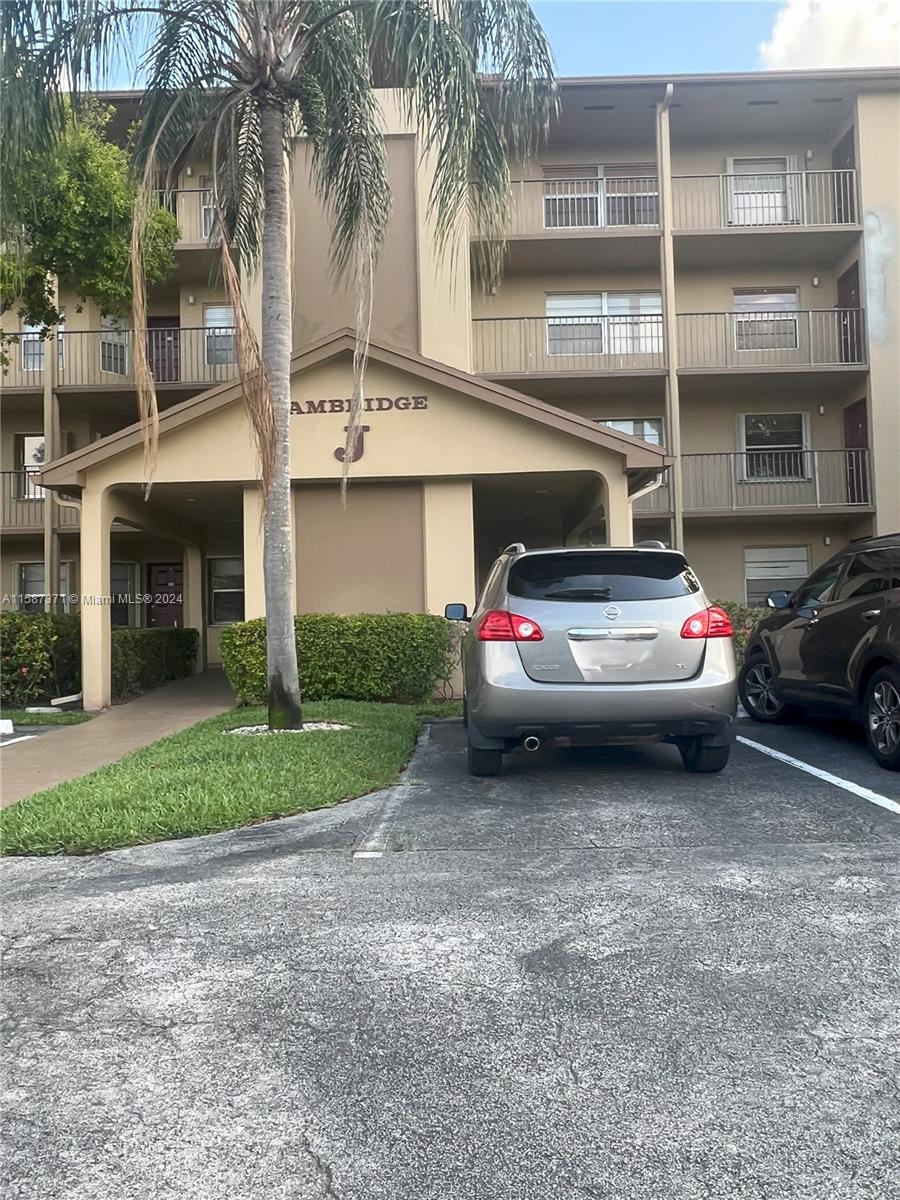 a car parked in front of a house