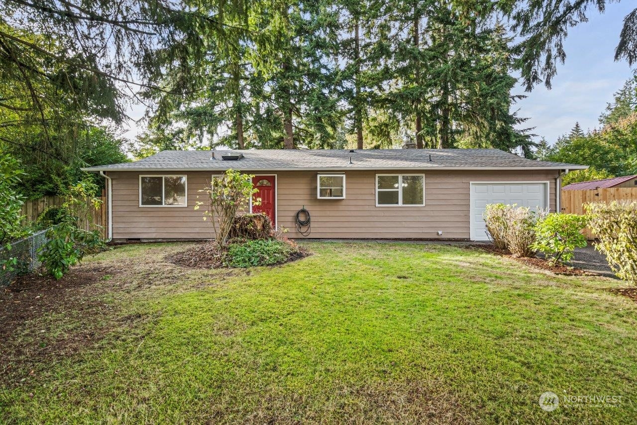 front view of house with a yard