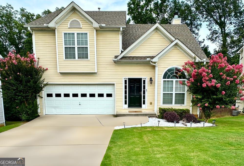 a house view with a garden space