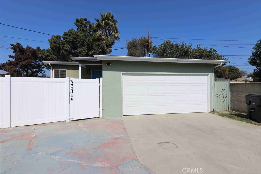 a view of a house with a garage