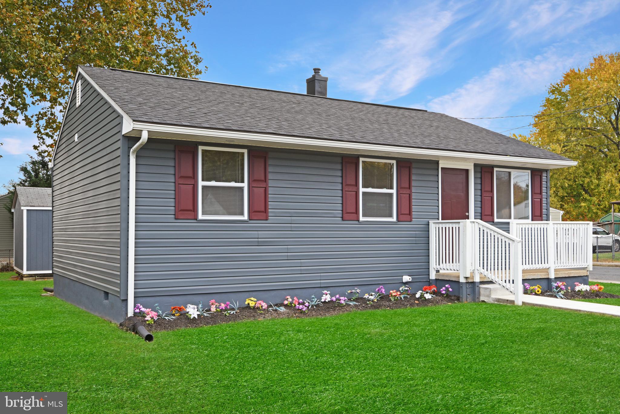 a front view of house with yard