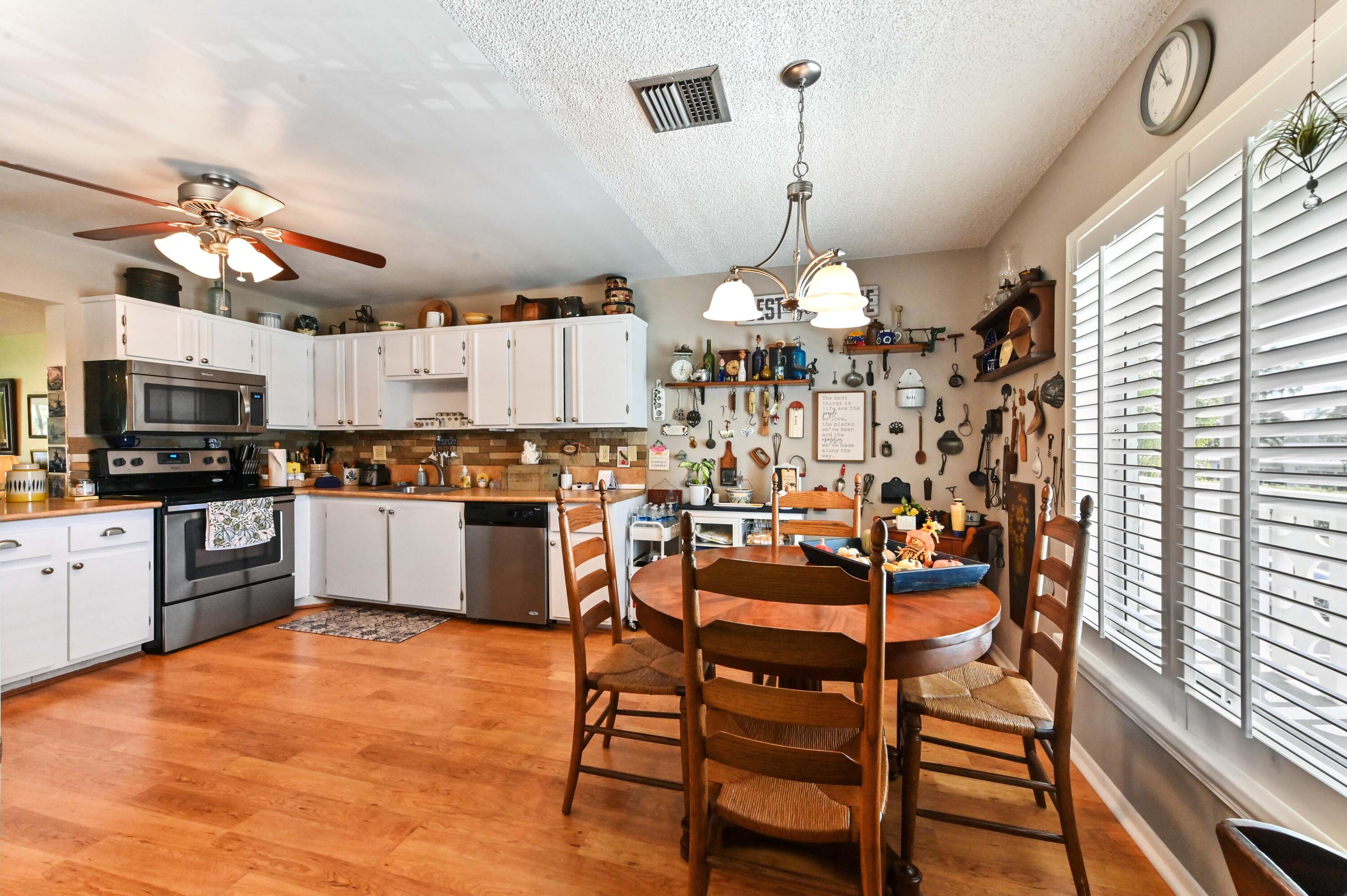 a view of a kitchen with granite countertop lots of counter top space