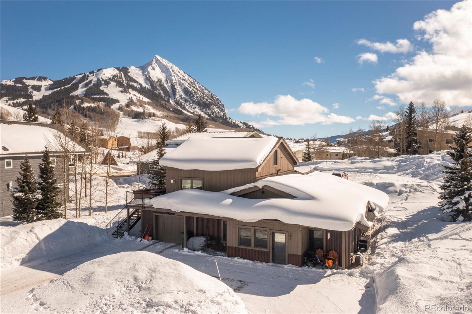 a view of a house with a snow