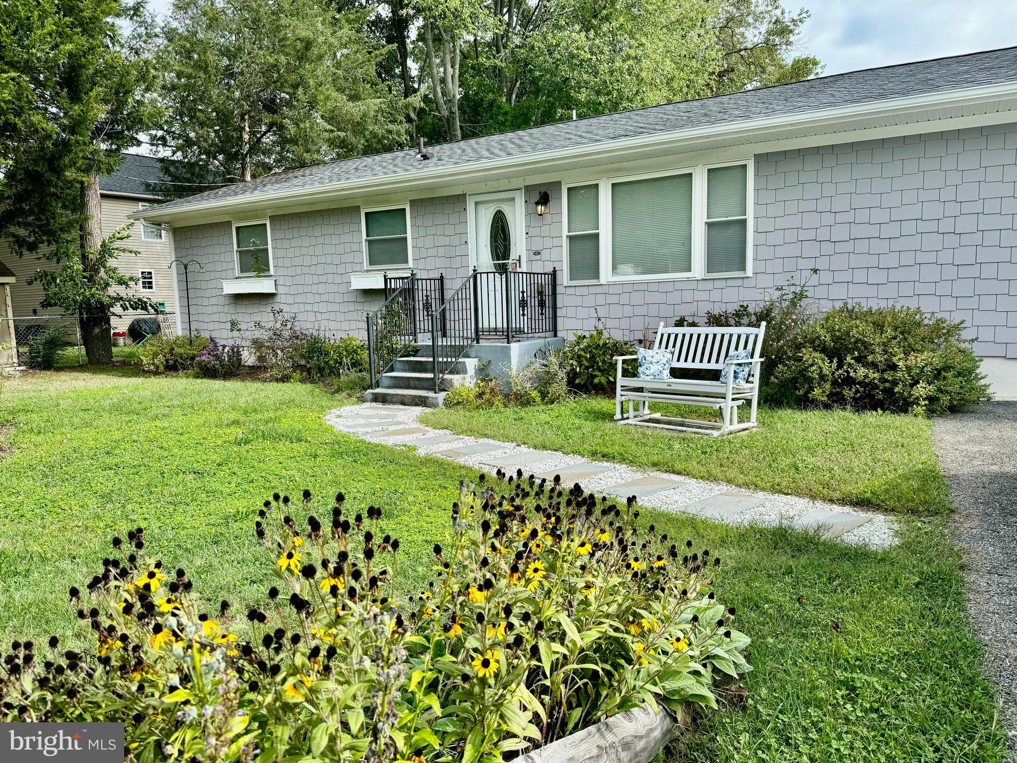 a house view with a garden space