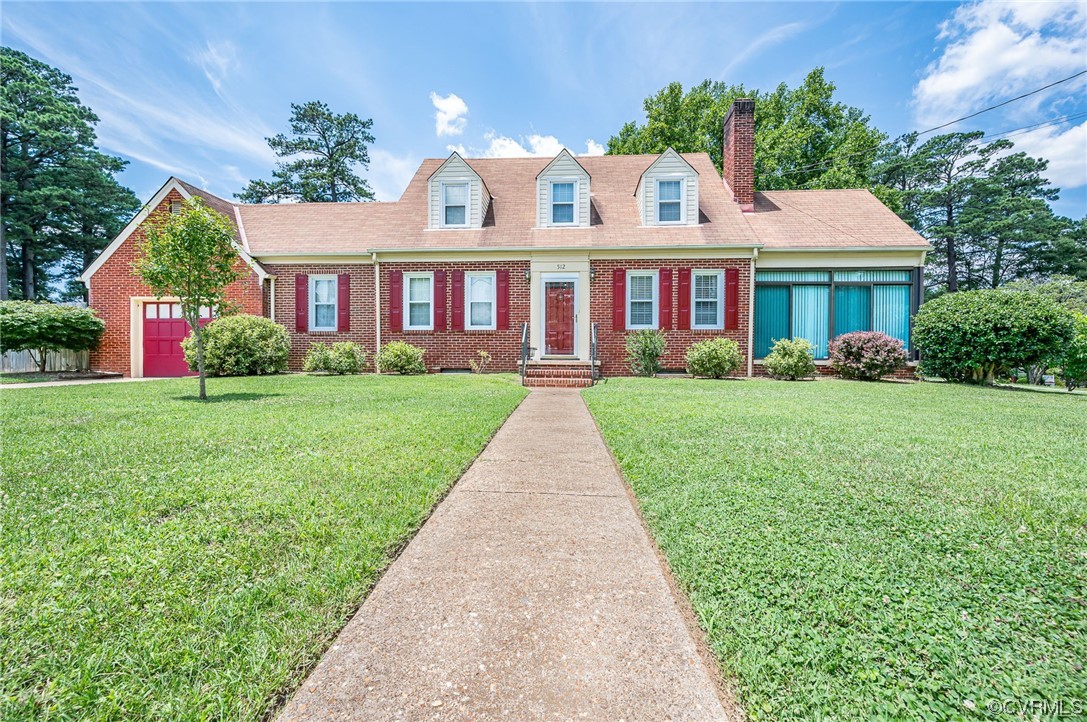 a front view of house with yard