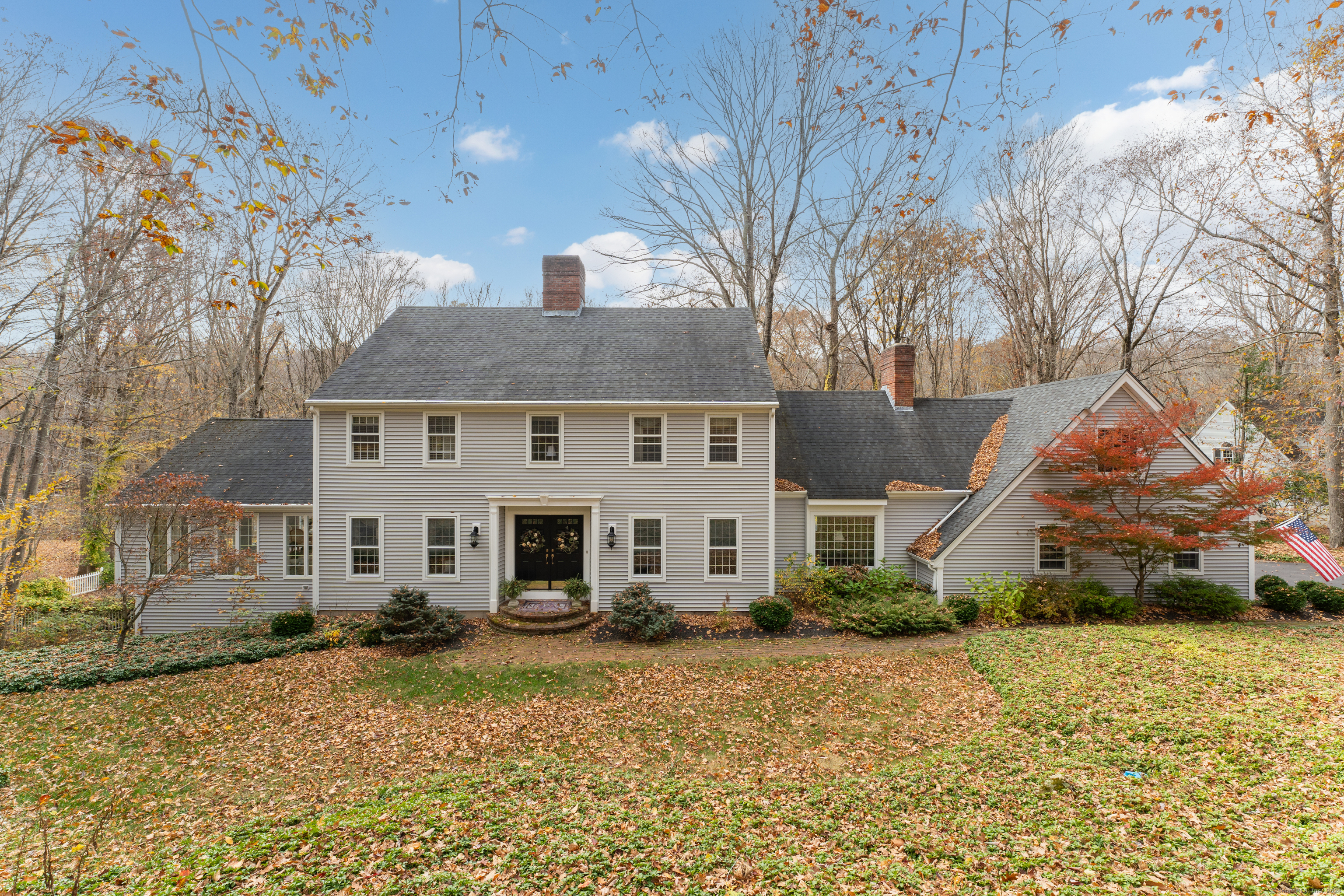 front view of a house with a yard