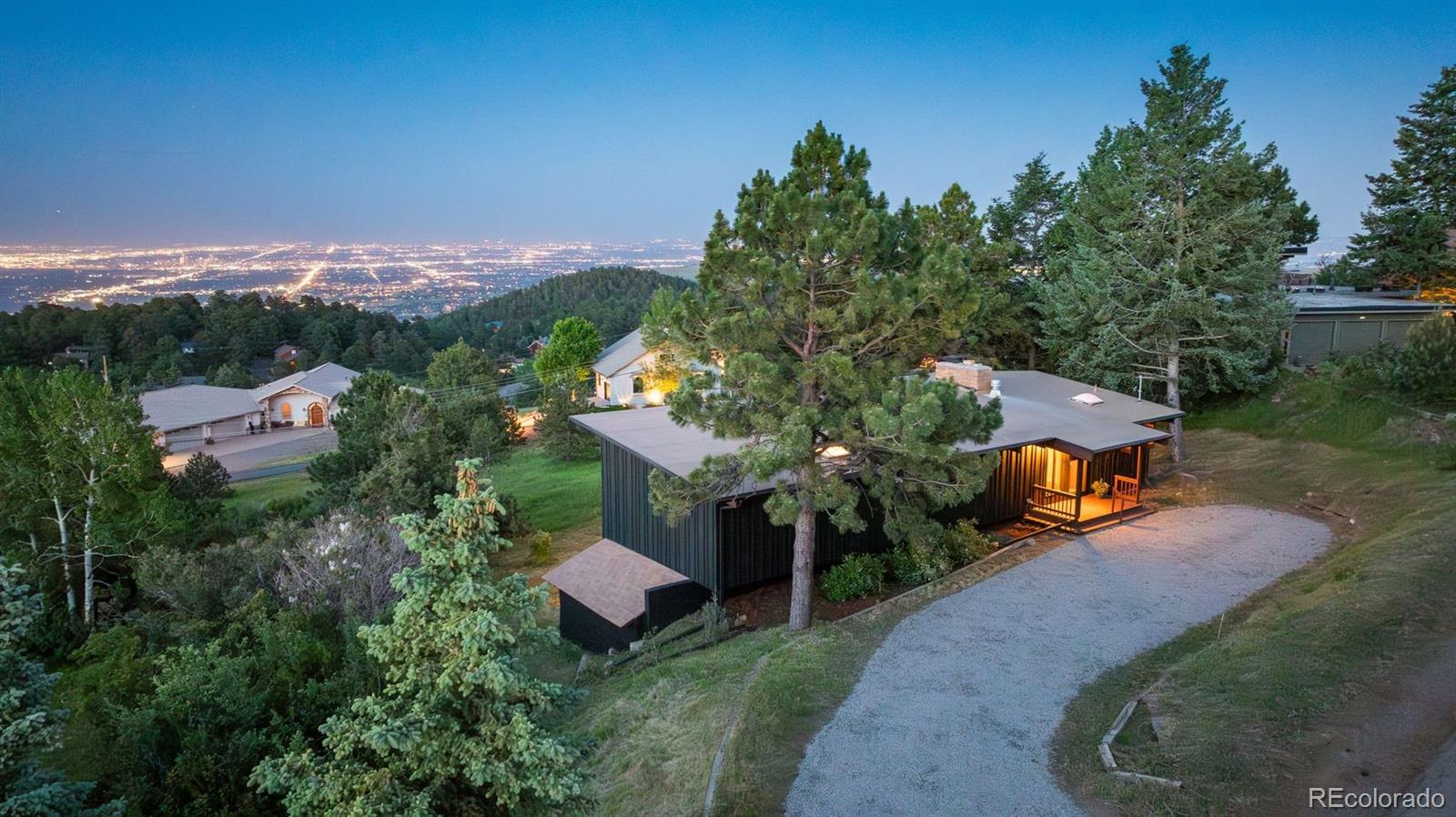 an aerial view of a house with an outdoor space