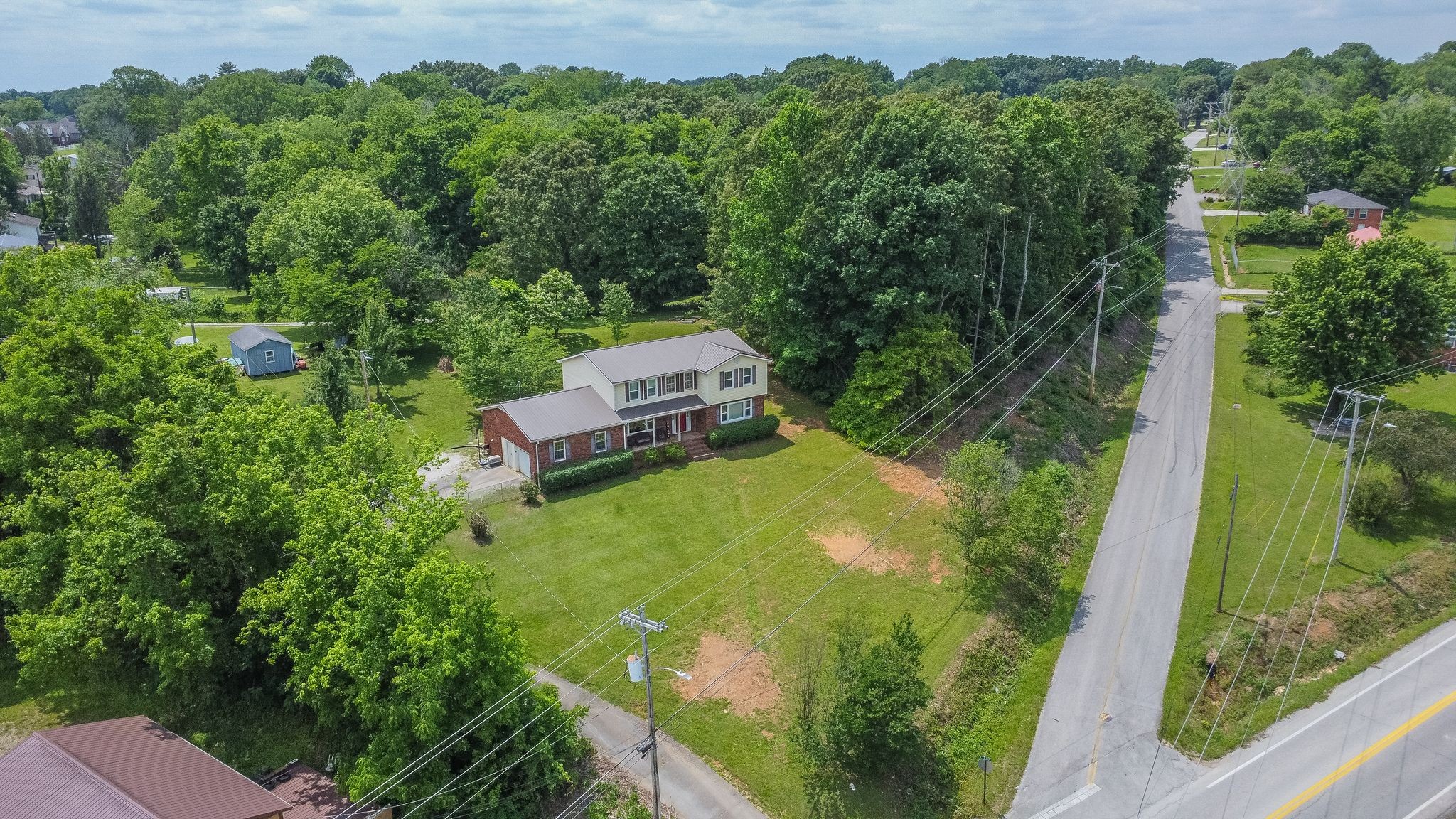 an aerial view of a house with yard outdoor seating and entertaining space