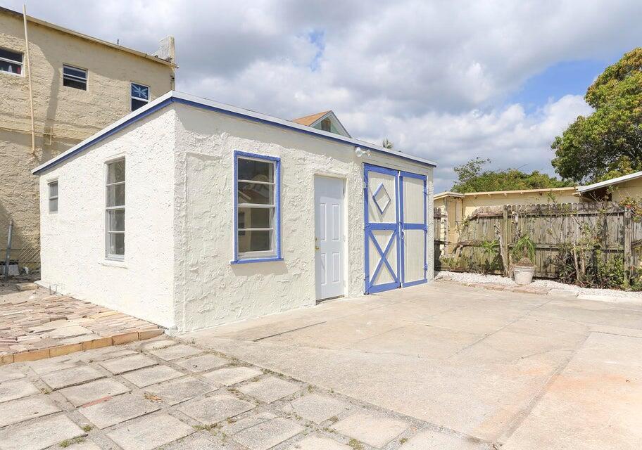 a front view of a house with a garage