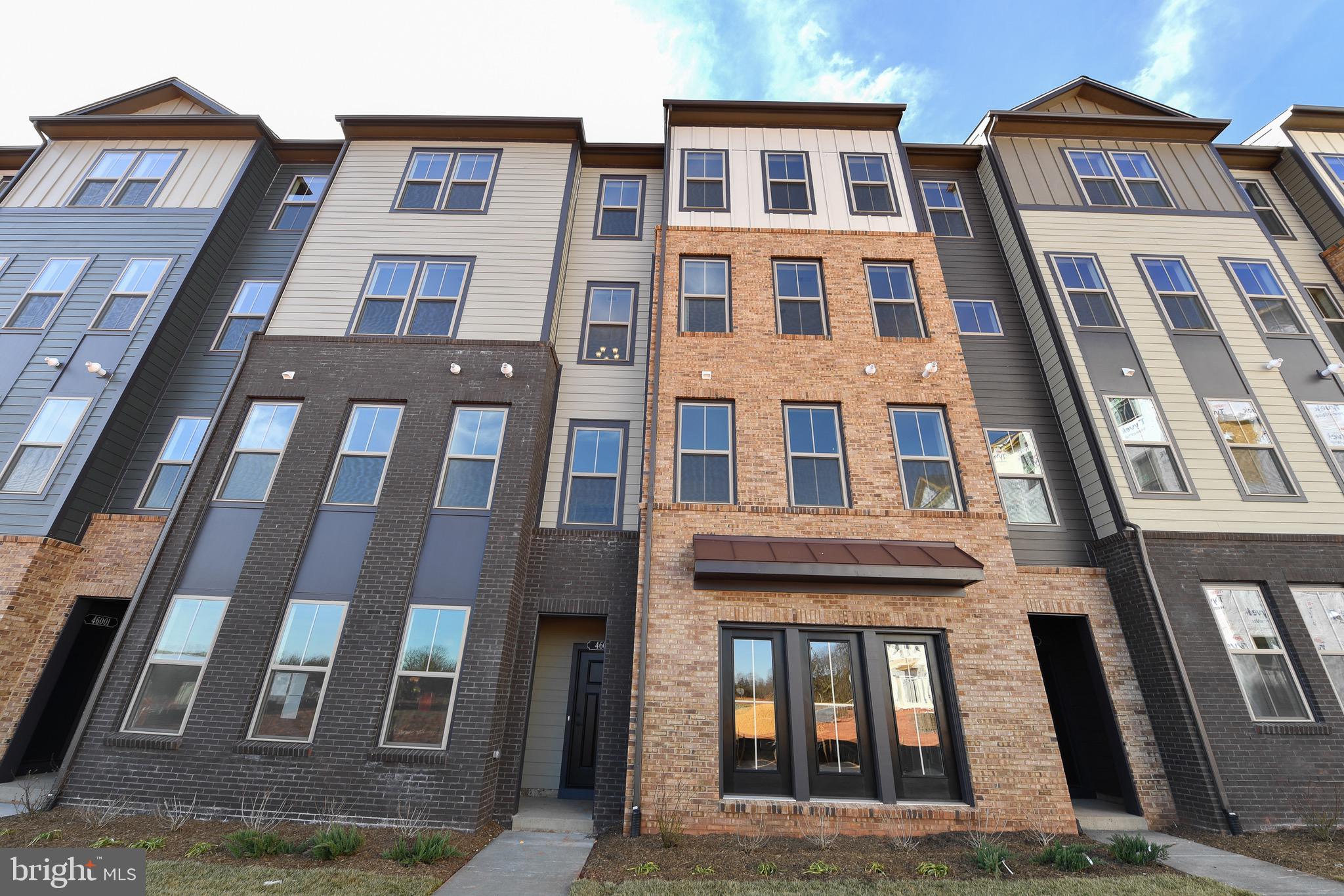 a front view of a multi story residential apartment building