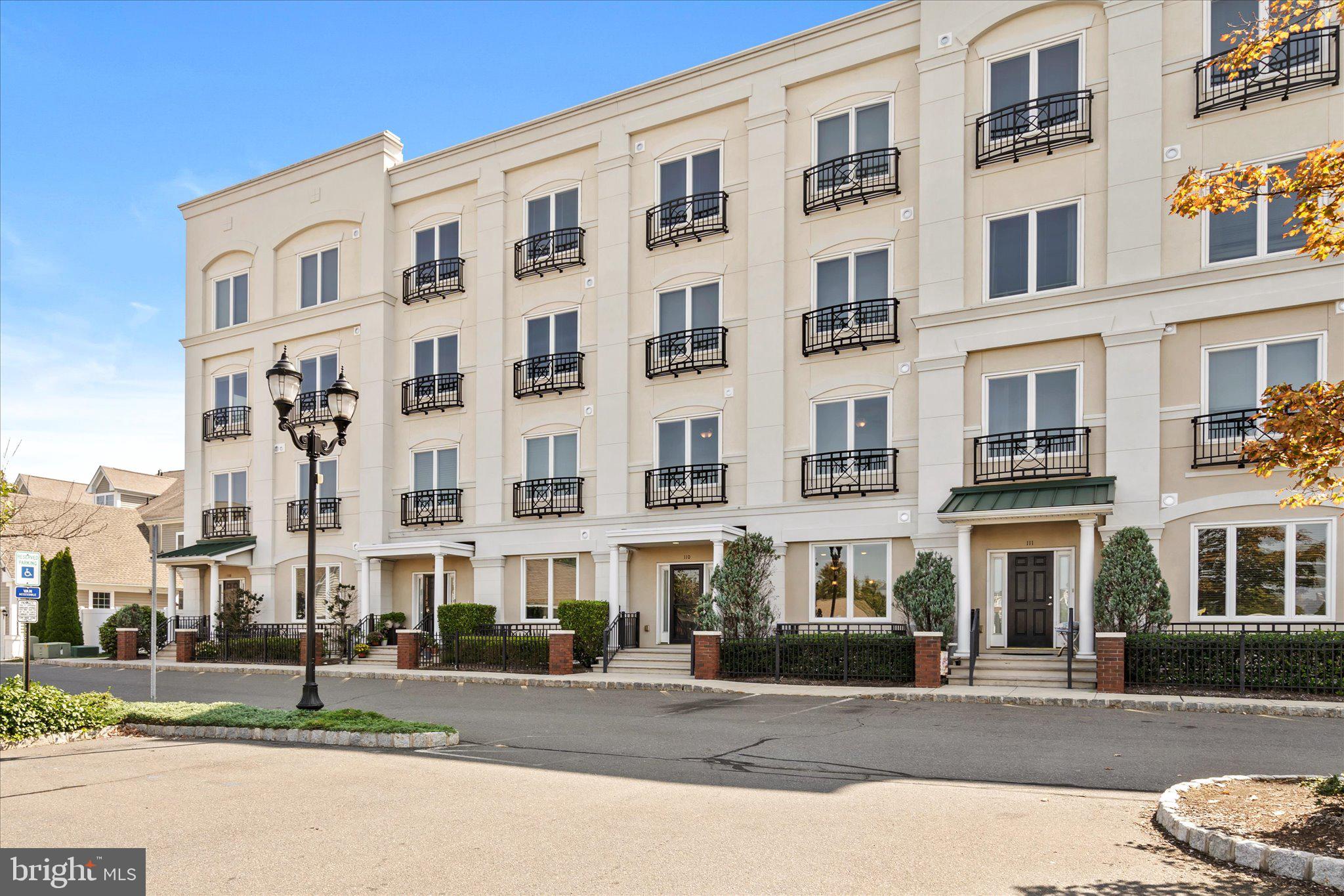 a front view of a building with street view