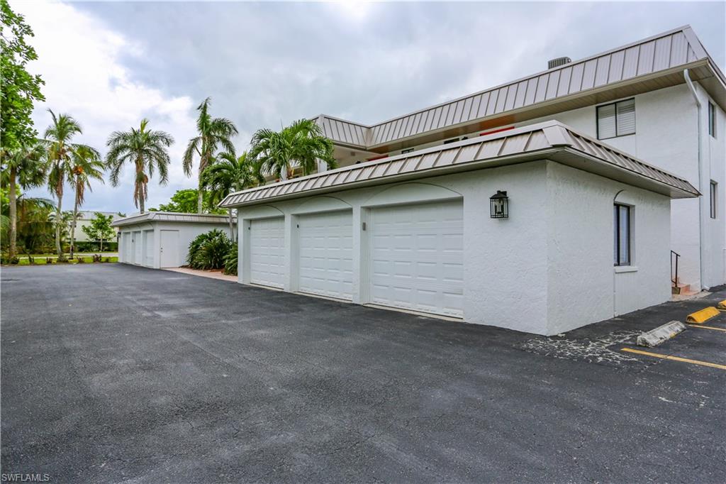 a house with a yard and garage