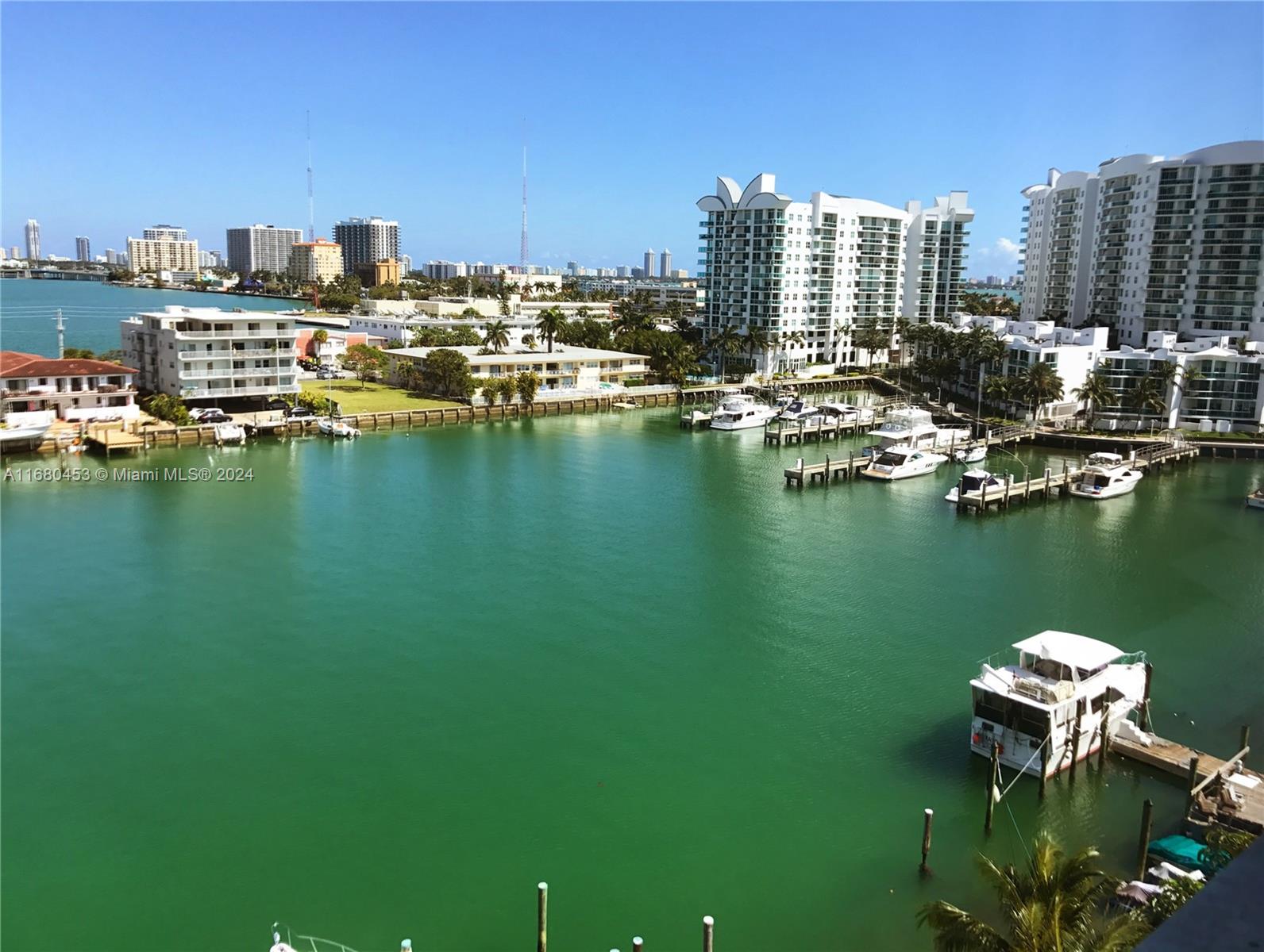 a view of a ocean with tall building