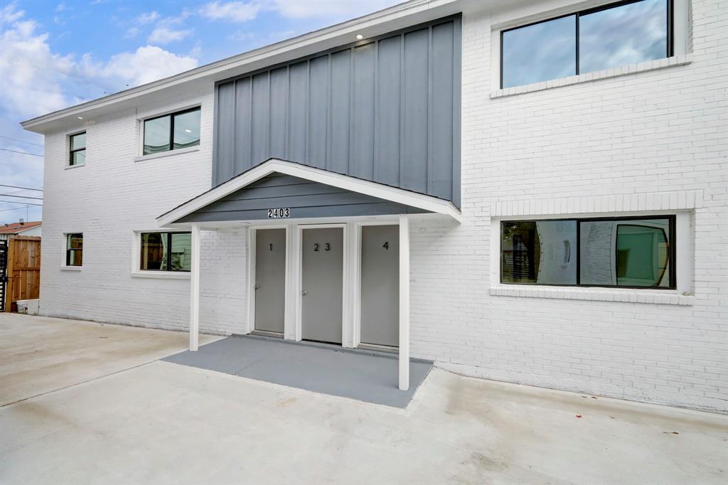 a front view of a house with a garage