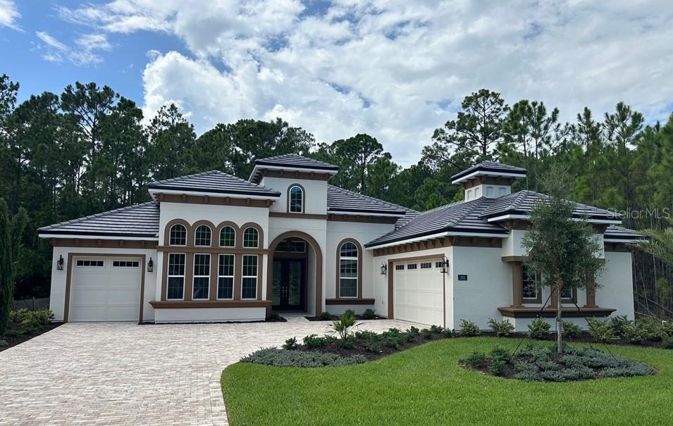 front view of a house with a yard