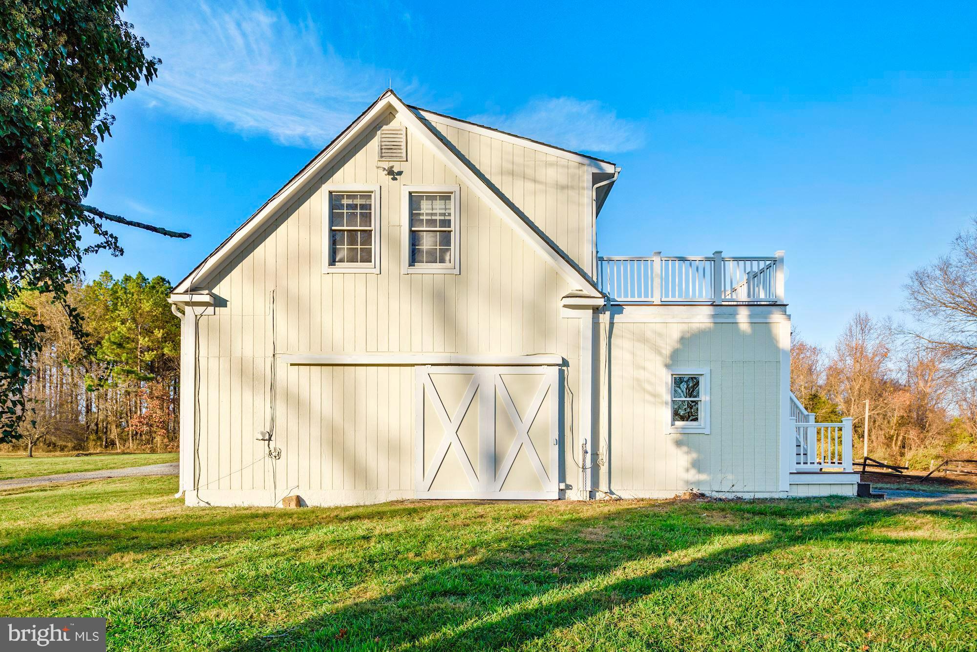 a view of a back yard of the house