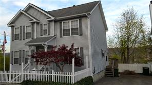 a front view of a house with balcony