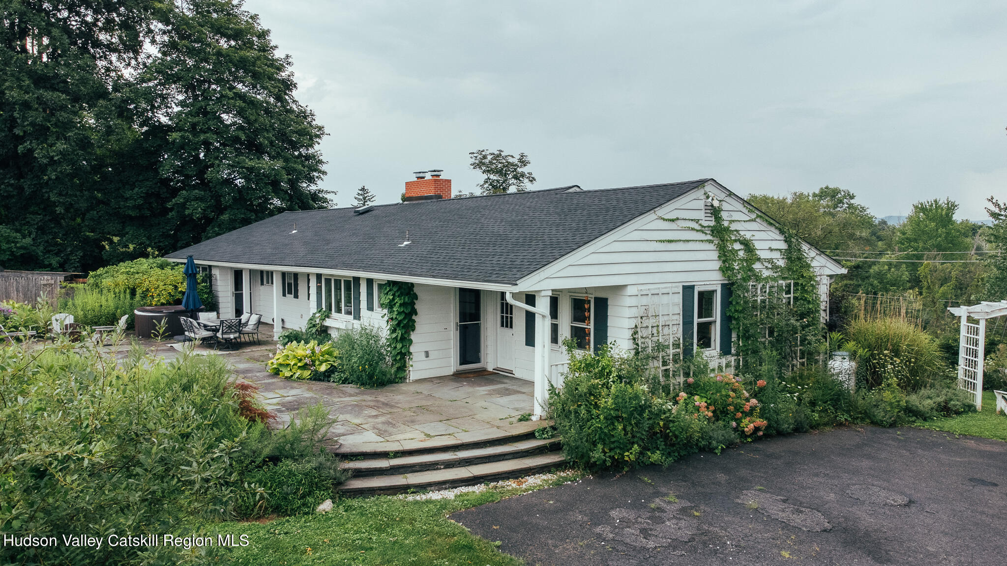 a house with trees in the background