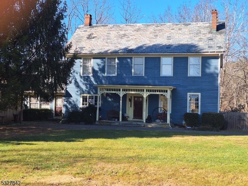 a view of a house with a swimming pool