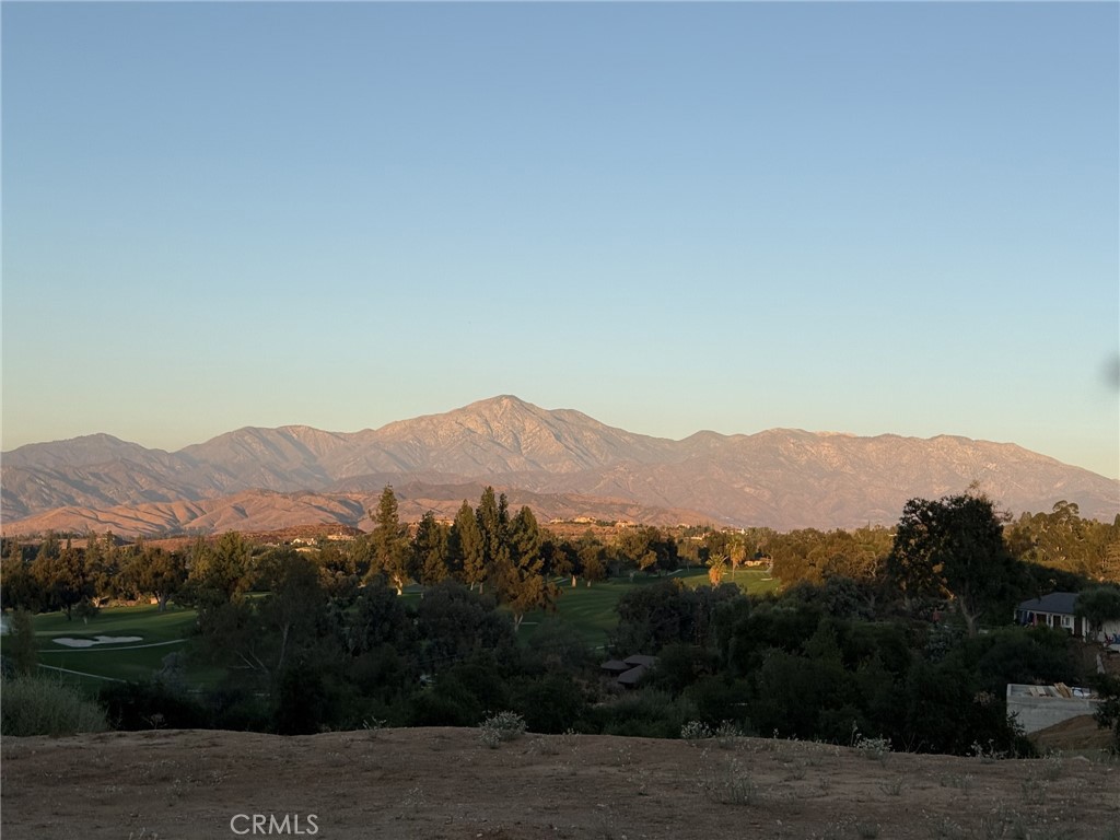 a view of mountains and valleys